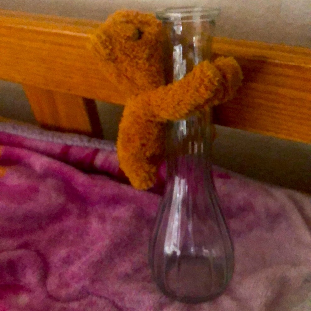 Vase with little teddy bear